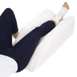 Foam leg elevation pillow holding the leg above heart height